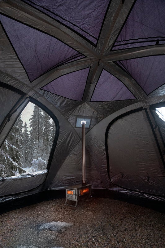 L&auml;mmitett&auml;v&auml;ss&auml; teltassa kamiinan hormin l&auml;pivienti